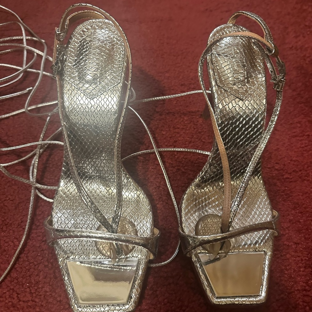 Brand- Schutz Color - Silver Size- 8.5 ***** basically brand new**** wore once